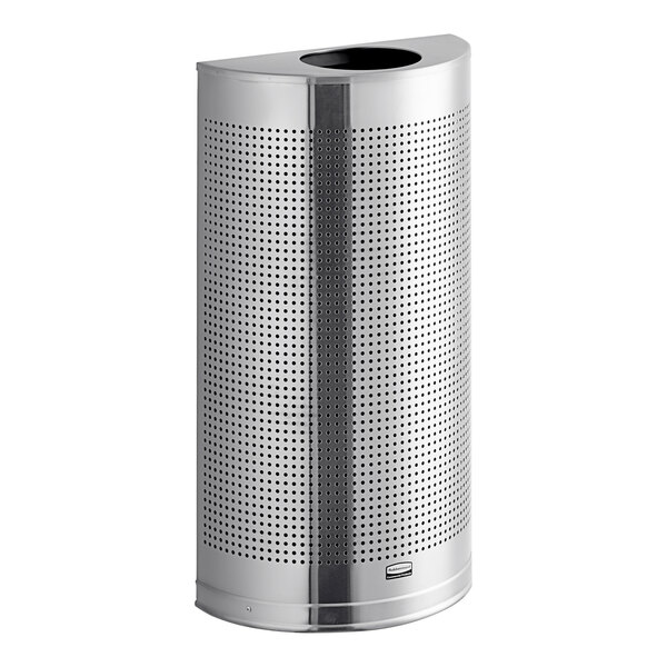 A close-up of a silver Rubbermaid Silhouettes half round waste receptacle with holes in it.