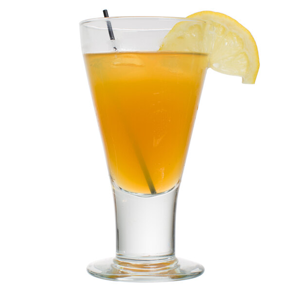 A Libbey Catalina goblet filled with a drink and a lemon slice.