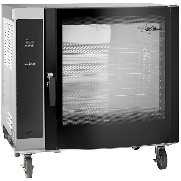A large black and silver Alto-Shaam rotisserie holding cabinet with a glass door.