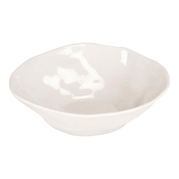 A white melamine bowl with a slightly irregular, organic shape.