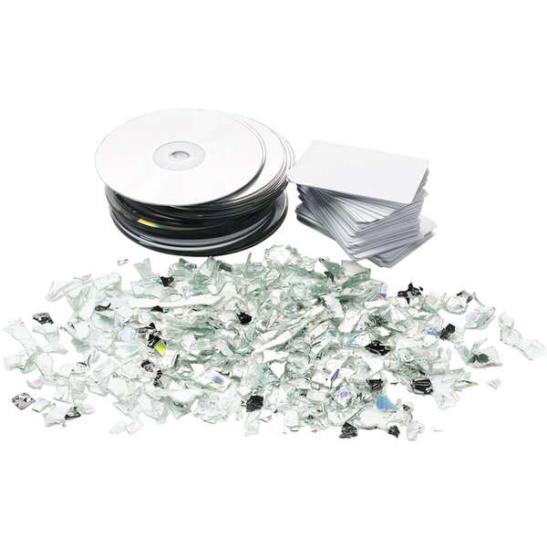 A pile of broken CD's and a CD case.