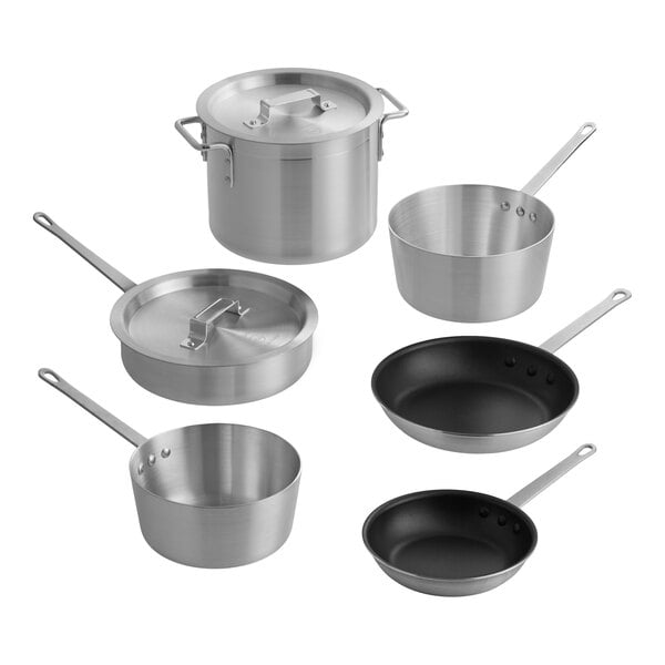 A set of six silver-colored pots and pans, including two with lids and two non-stick frying pans, all with metal handles.