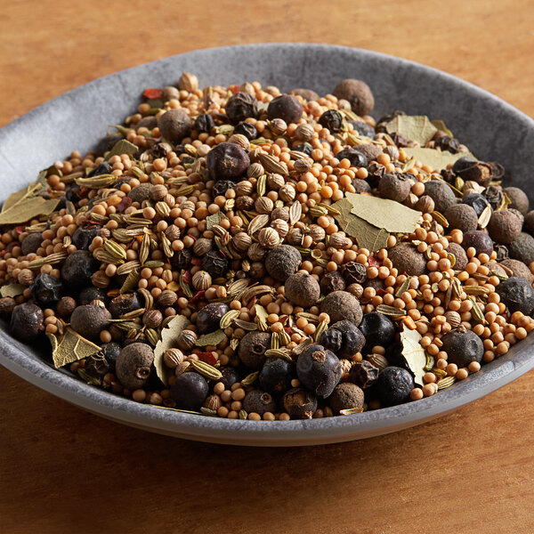 A bowl of Regal Old Fashioned Pickling Spice on a table.