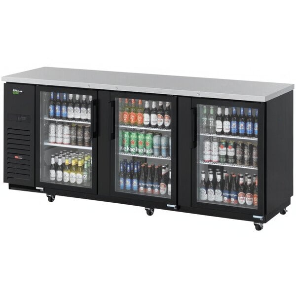 A Turbo Air Super Deluxe back bar cooler with glass doors full of beverages.