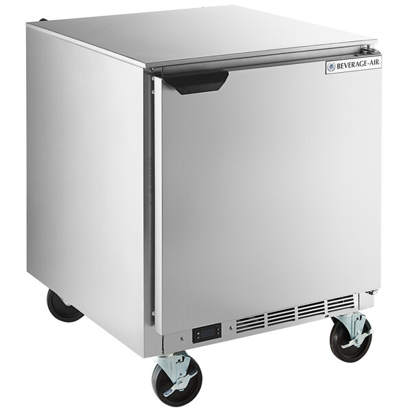 A stainless steel Beverage-Air undercounter freezer with wheels.