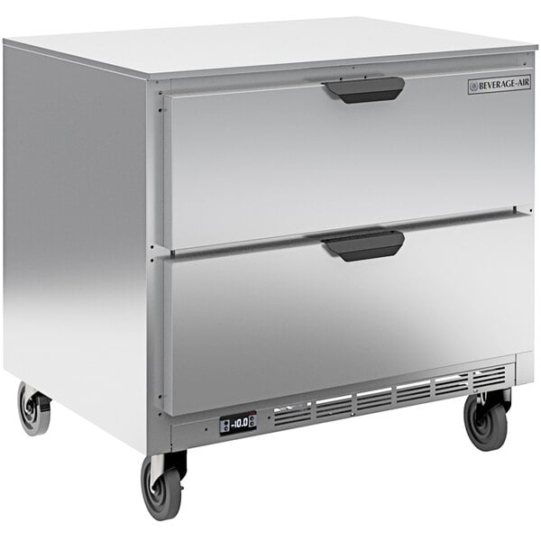 A silver Beverage-Air undercounter freezer with two drawers.