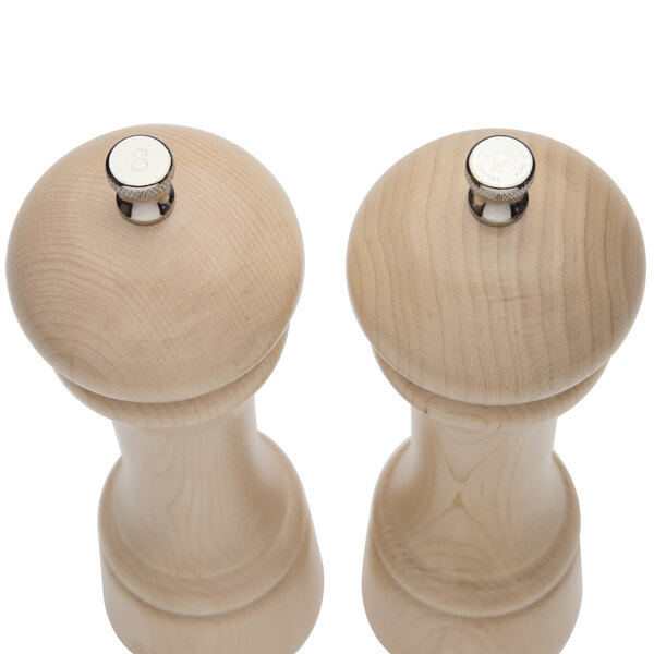 A Chef Specialties Windsor Natural Maple salt and pepper mill set with silver caps.