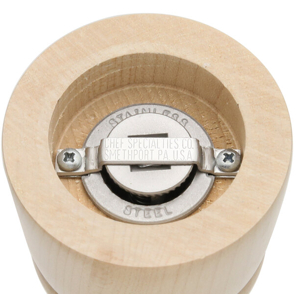 A close-up of a Chef Specialties Windsor natural maple pepper and salt mill set with a metal grinder.