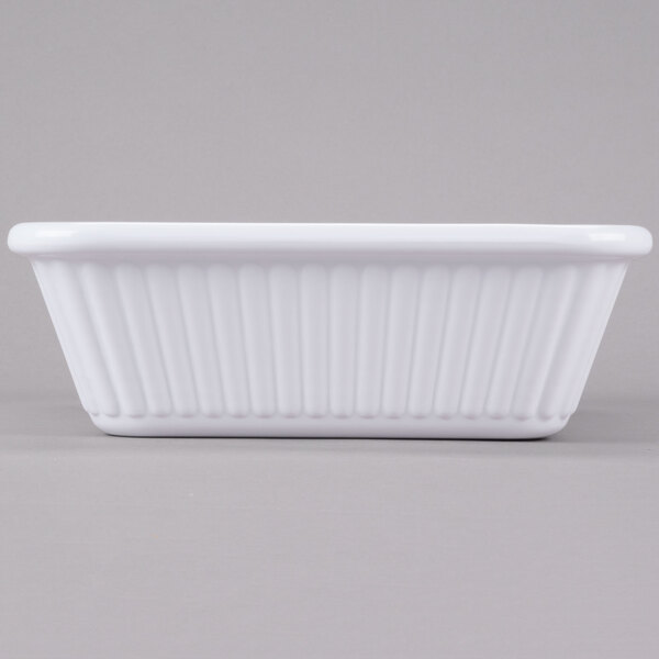 A white rectangular melamine casserole dish.