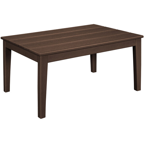 A brown POLYWOOD coffee table with wooden legs and a wooden top.