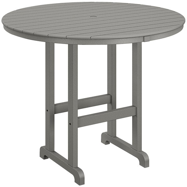 A POLYWOOD round bar height table with a gray top and legs.