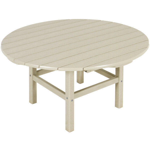 A white round POLYWOOD table with a circular wooden surface and legs.