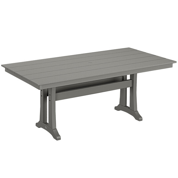 A POLYWOOD grey rectangular table with legs.
