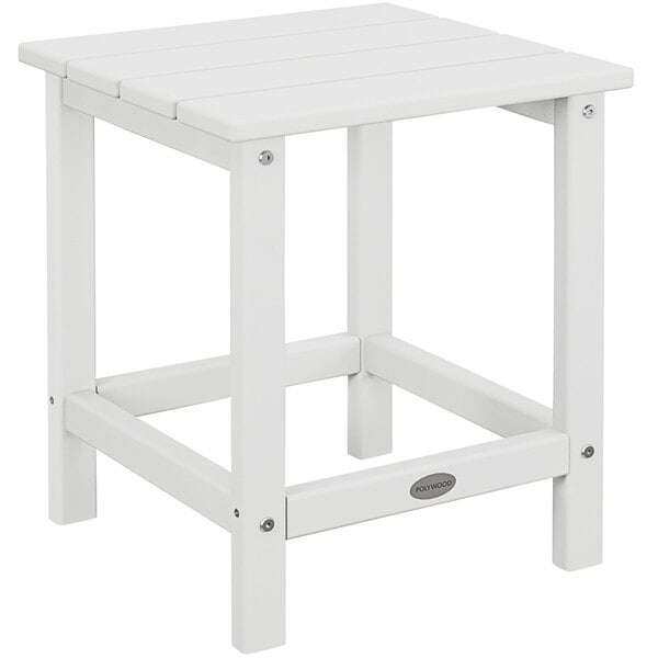 a white stool with a square top