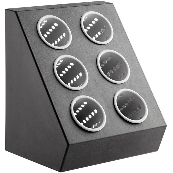 A gray plastic flatware organizer with six perforated cylinders.