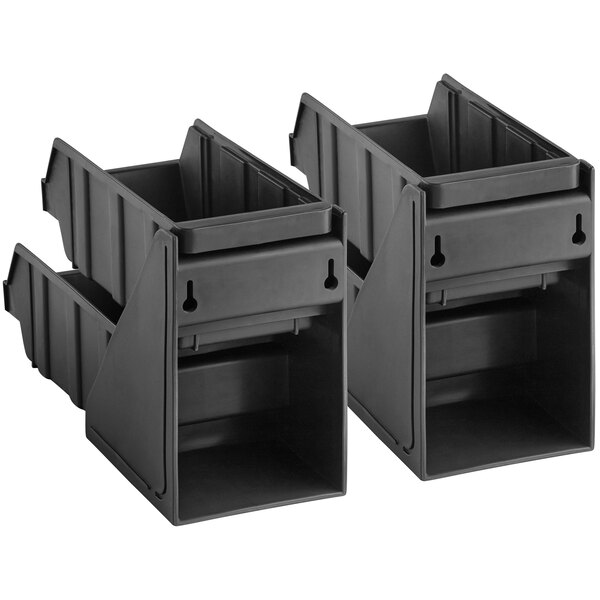 A pair of black plastic bins with a shelf.