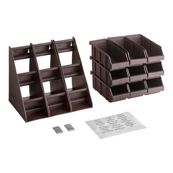 A brown three-tier organizer set with nine stackable bins, two small gray clips, and two sheets of labels.