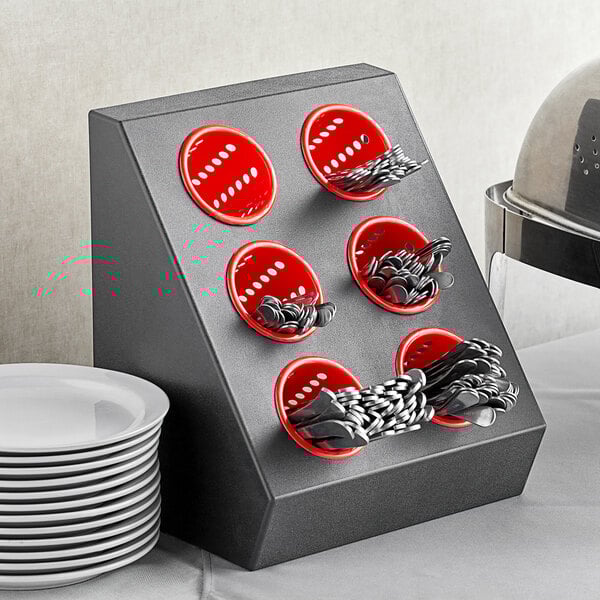 a red bin full of coins