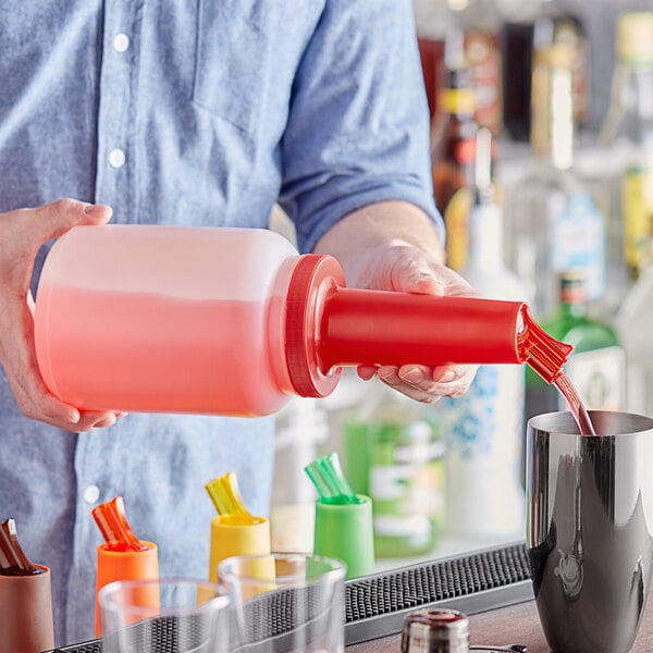 A person pouring liquid from a red Choice plastic container.