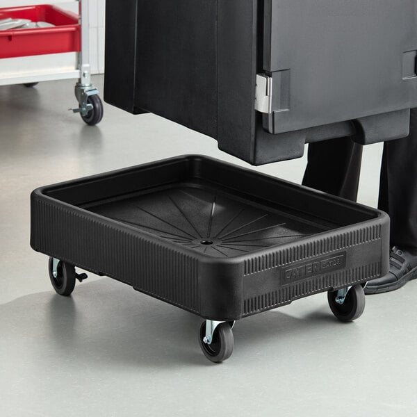 A black dolly designed for transporting insulated food pan carriers, with a 300 lb. capacity.