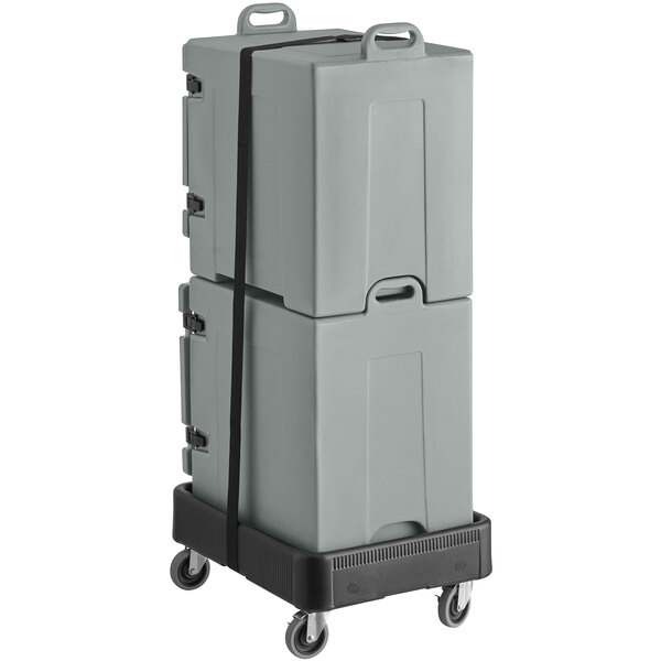 A black dolly with two grey CaterGator food pan carriers on it.