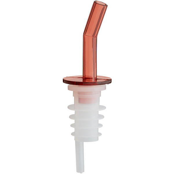 A red plastic whiskey pourer tube.