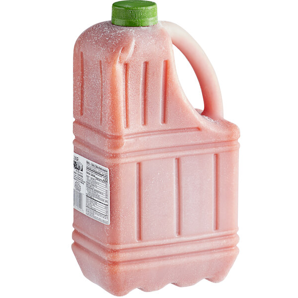 A pink jug of Elixir Guava Pulp with a green lid.