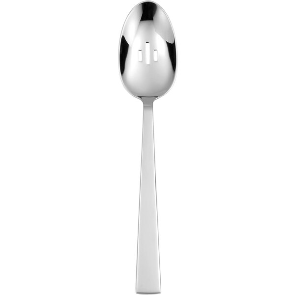 A Sant'Andrea Fulcrum stainless steel slotted serving spoon with a long handle and holes.