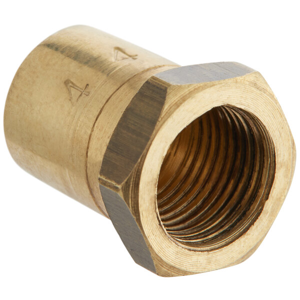 A brass Avantco #44 orifice with a nut.