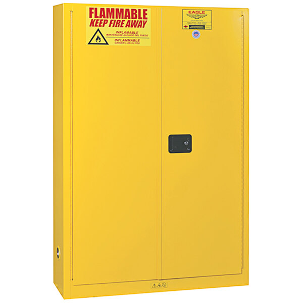 A yellow metal safety cabinet with two self-closing doors.