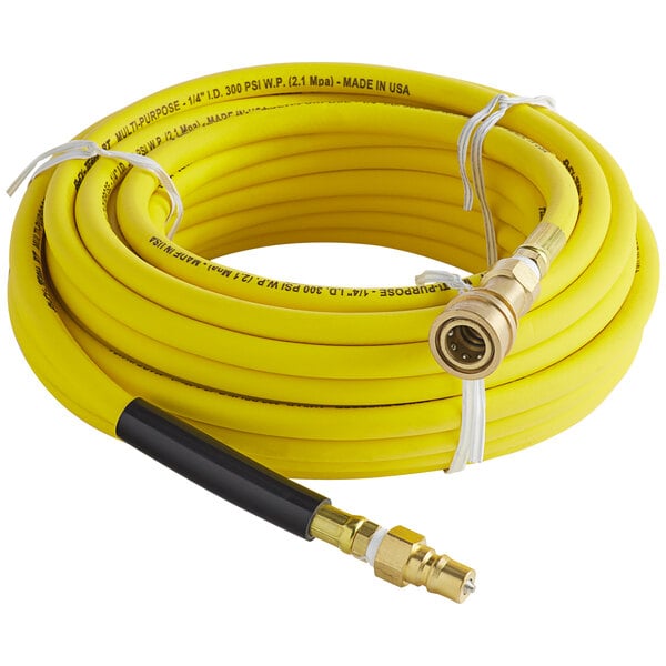 a yellow hose with a black handle