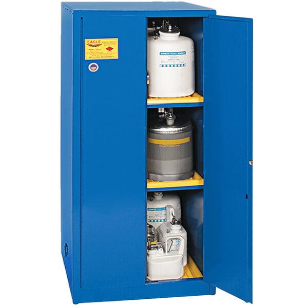 A blue Eagle Manufacturing safety cabinet with white containers inside.