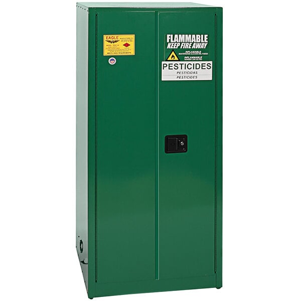 A green metal safety cabinet with two self-closing doors.