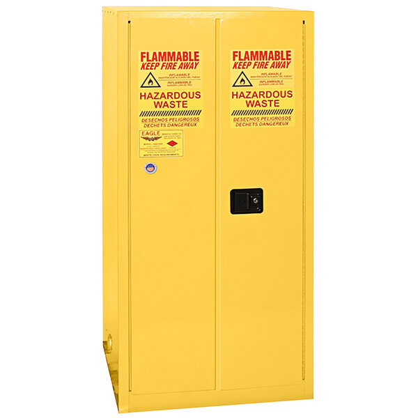 A yellow metal safety cabinet with red and yellow labels.