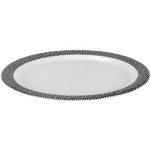 A white plate with a black and white checkered rim.