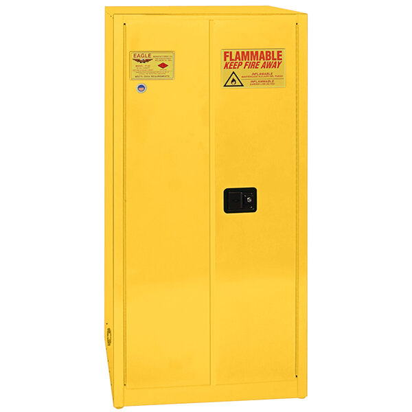 A yellow metal safety cabinet with two self-closing doors.