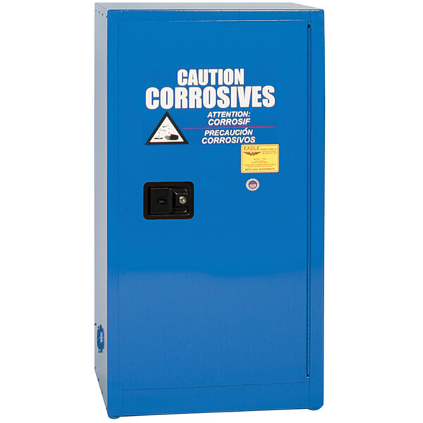 A blue metal Eagle Manufacturing safety cabinet with white text reading "Acid/Corrosive"