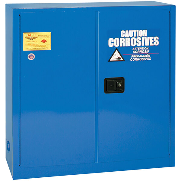 A blue metal Eagle Manufacturing safety cabinet with white text.