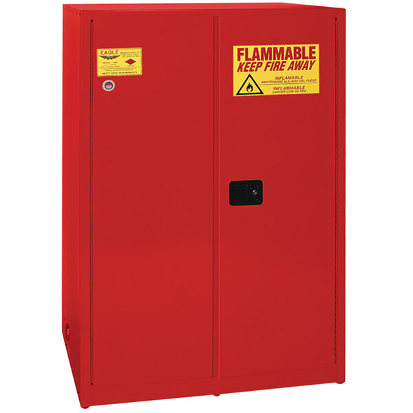 A red metal Eagle safety cabinet with yellow warning labels.