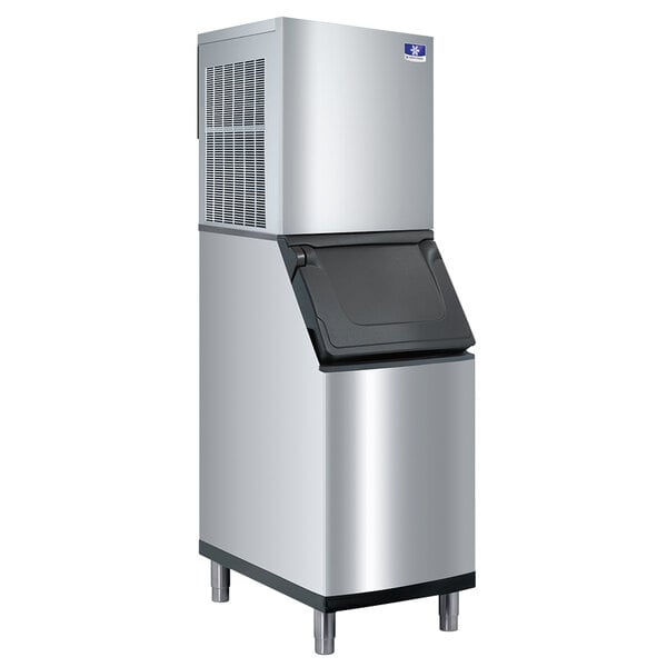 A stainless steel Manitowoc air cooled flake ice machine with a black lid.