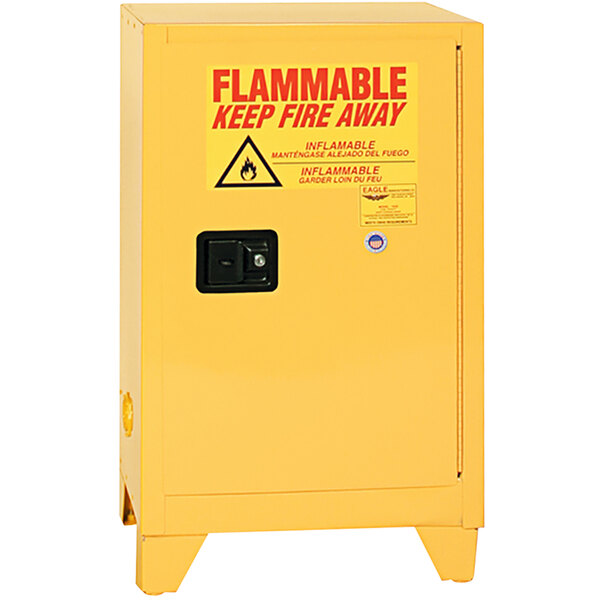 A yellow Eagle Manufacturing safety cabinet for flammable liquids with self-closing doors and legs.