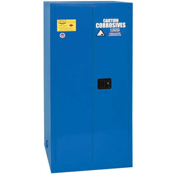 A blue metal Eagle Manufacturing safety cabinet with a yellow label.