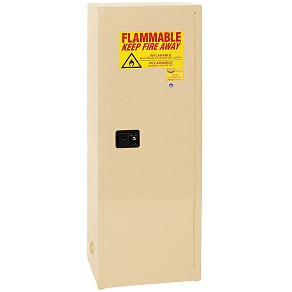 An Eagle Manufacturing beige safety cabinet with a yellow warning sign.