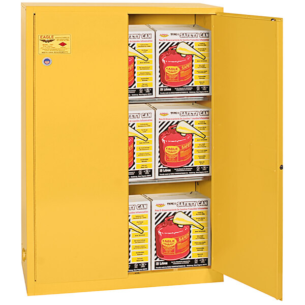 A yellow Eagle flammable liquid safety cabinet with manual-closing doors open.