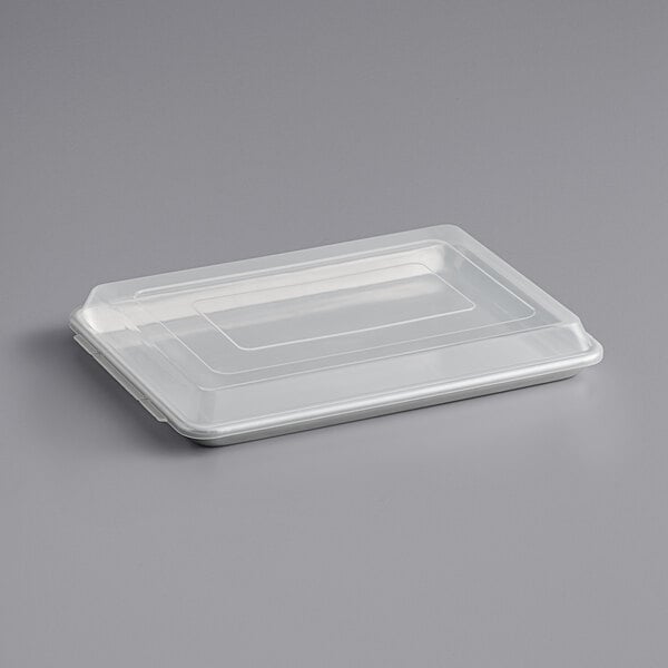 A white plastic food container with a white plastic tray lid.