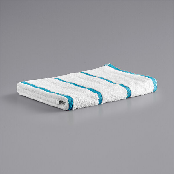 A white towel with scuba blue stripes.