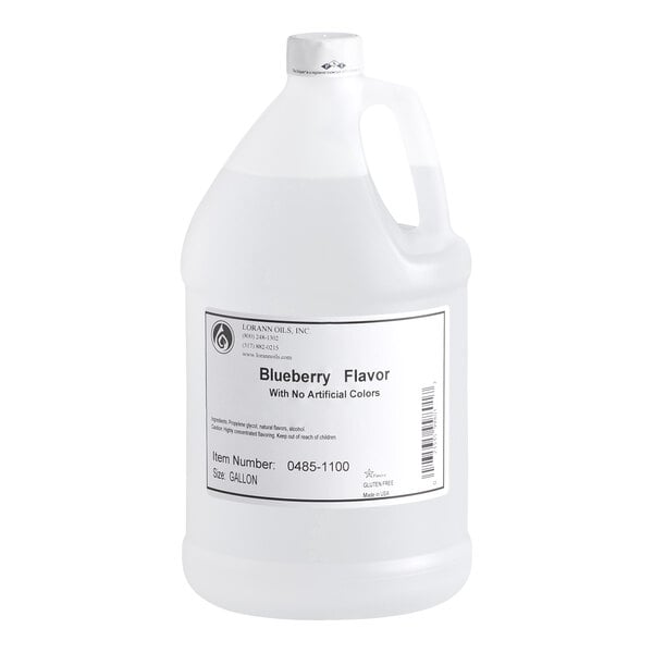 A large white plastic jug with a handle and a label indicating it contains blueberry flavor with no artificial colors.