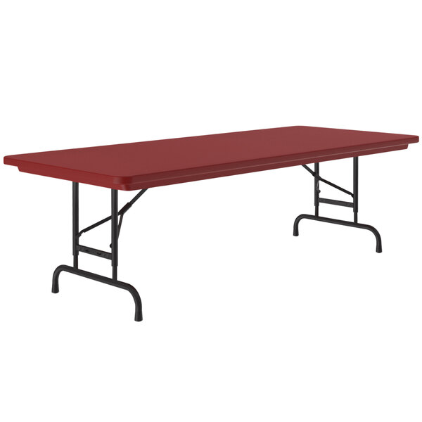 A red rectangular Correll folding table with black legs.