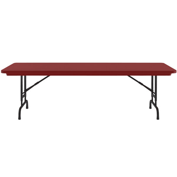 A red rectangular Correll folding table with black legs.