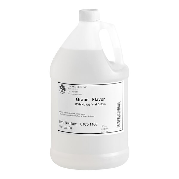 A large white plastic jug with a handle and a label indicating it contains grape flavor with no artificial colors.